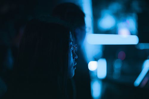 selective focus photography of woman wearing eyeglasses